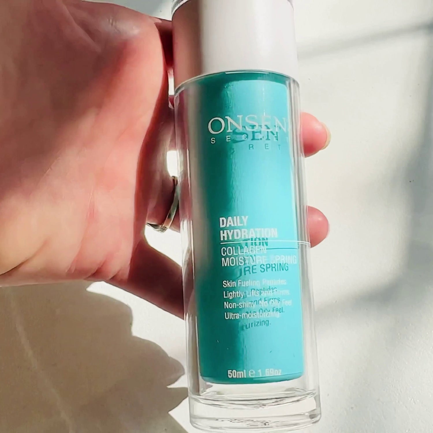 Onsen's Intense Hydration Moisturizer offers a ceramide and peptide blend to hydrate and repair dry skin, ideal for a gentle and nourishing skincare routine, promoting a soft, moisturized, and refreshed facial feel.